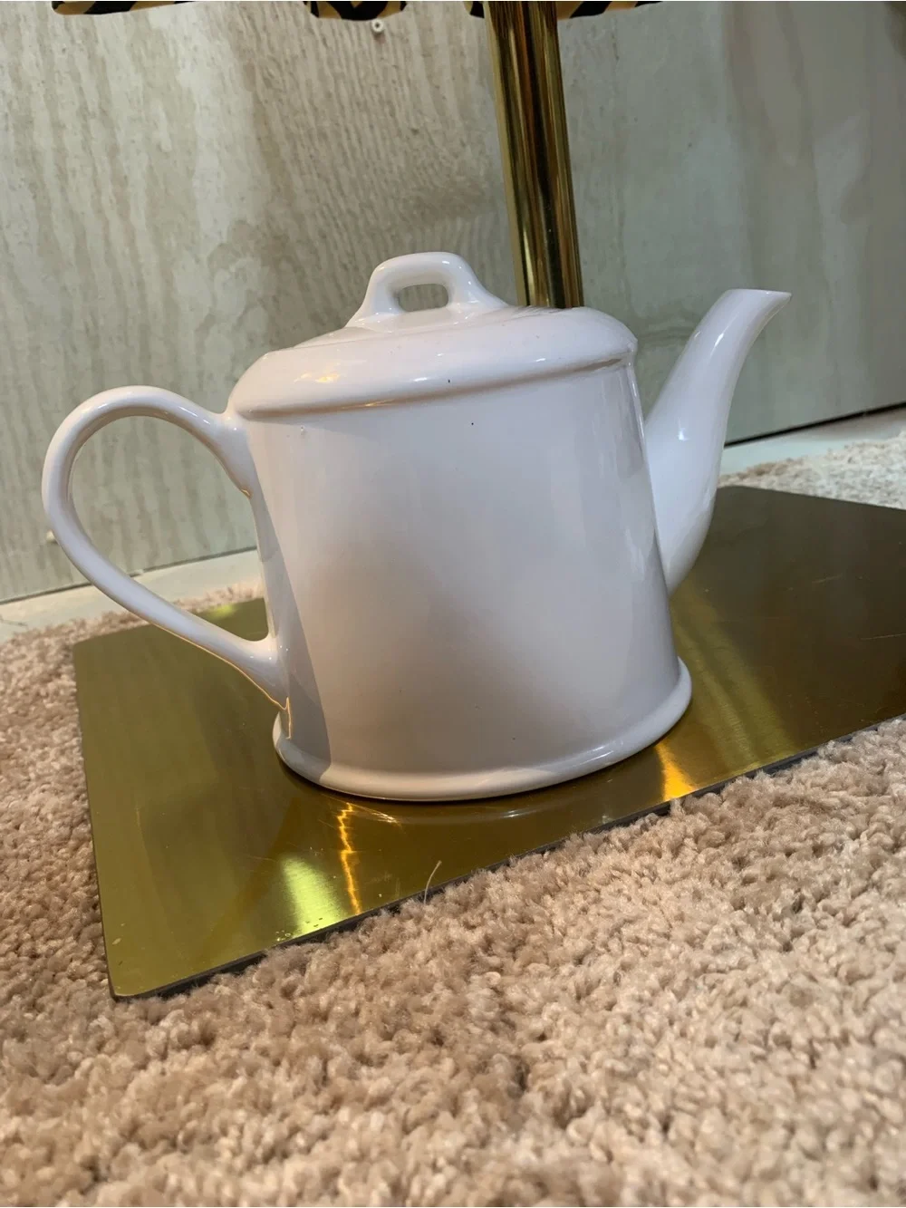 White Ceramic Teapot with Embossed 'Tea' Motif